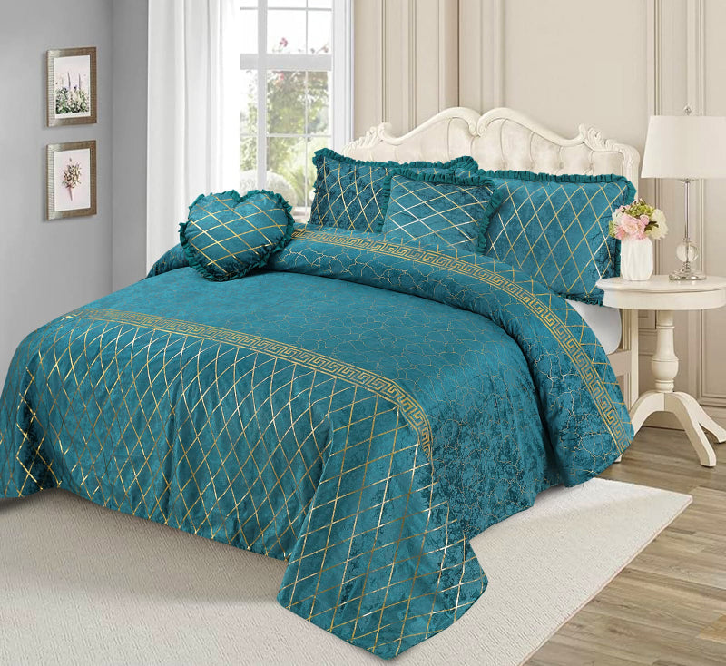 Teal bedspread with gold patterns